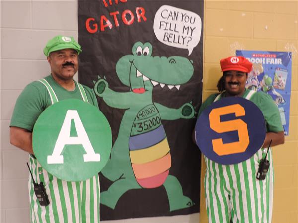 principal and assistant principal dressed as mario and luigi
